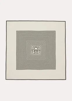 Centered monogram silk scarf crème