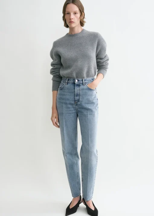 Tapered leg denim worn blue